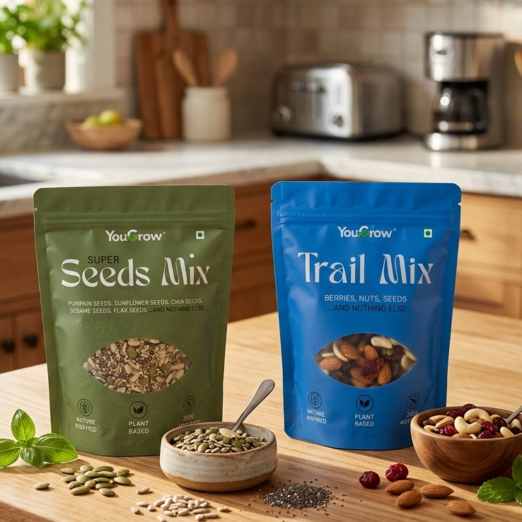 Two packages of YouGrow Super Seeds Mix and Trail Mix on a kitchen counter.